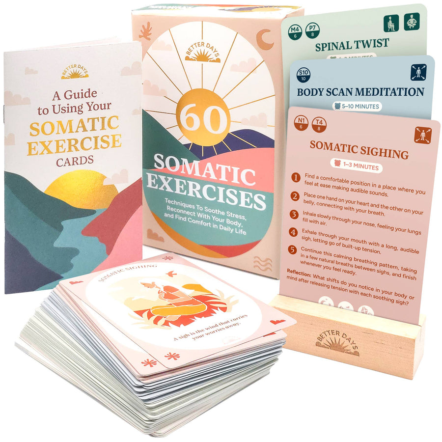 somatic exercise cards next to the box and user guide booklet. Release
