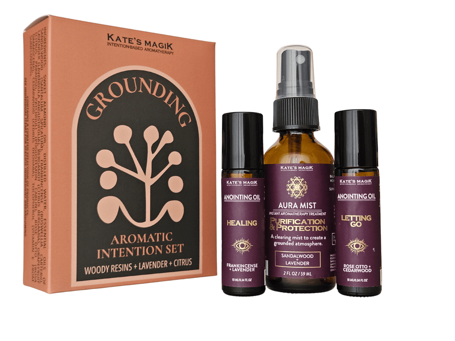 Amber spray bottles with terracotta packaging featuring a tree illustration, Aromatherapy in woody resin, lavender and citrus Grounding