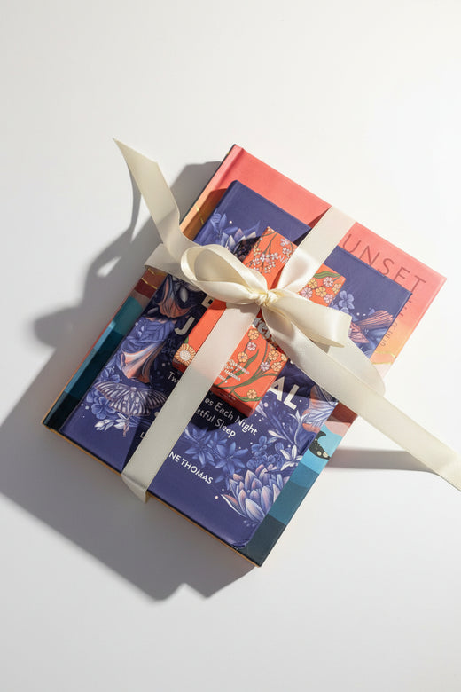 Gift Set with 2 books and a set of shower steamers.  Sunset Gratitude and bedtime journal.